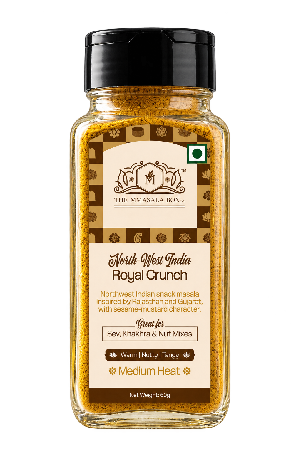 The Mmasala Box Co. North-West India Royal Crunch snack masala in a glass spice jar with black cap, professionally photographed on a clean white background.