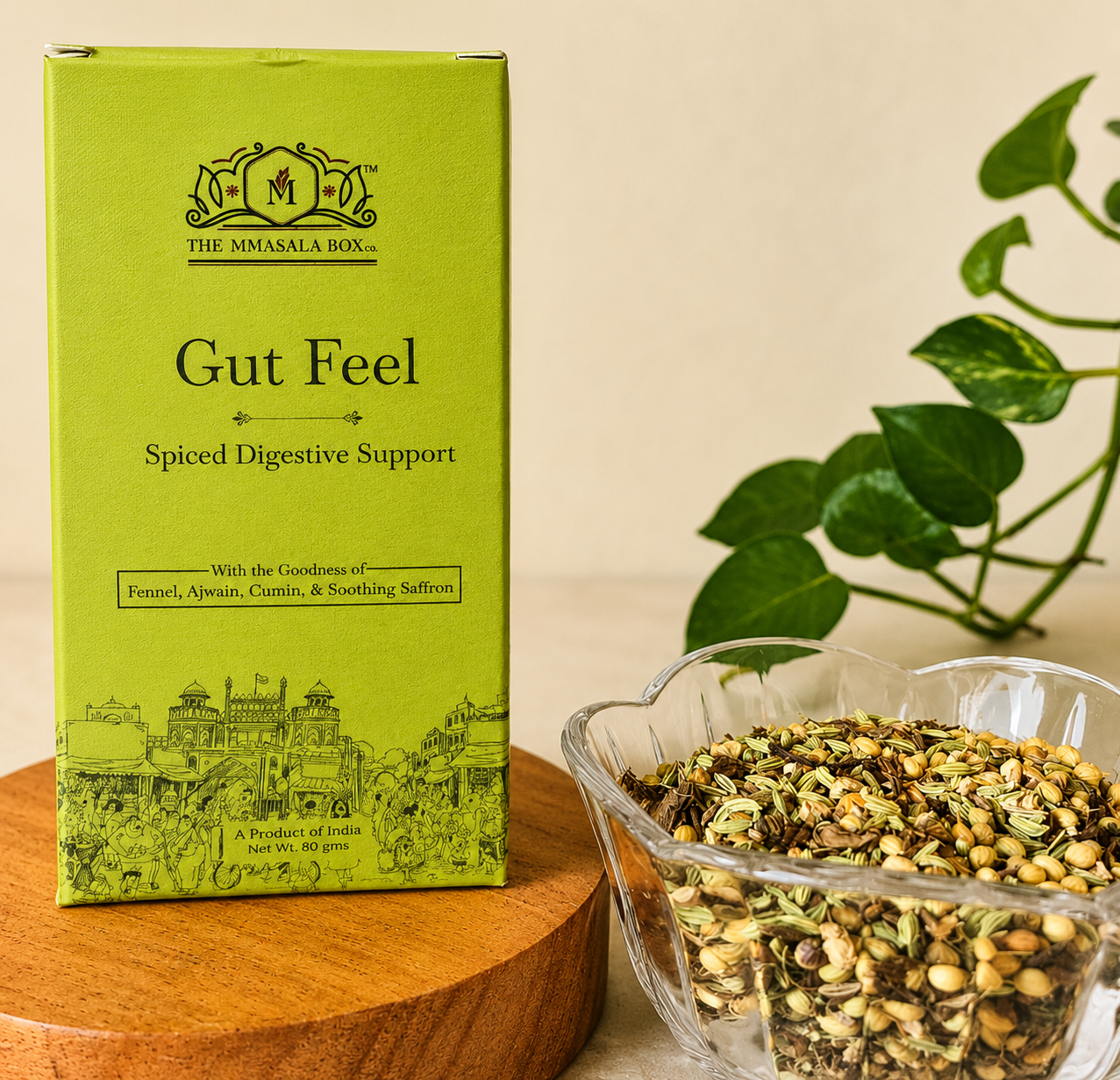 Gut Feel Spiced Digestive Support wellness blend by The Mmasala Box Co. displayed with fennel, ajwain, cumin, and saffron ingredients in a premium lifestyle product setup.