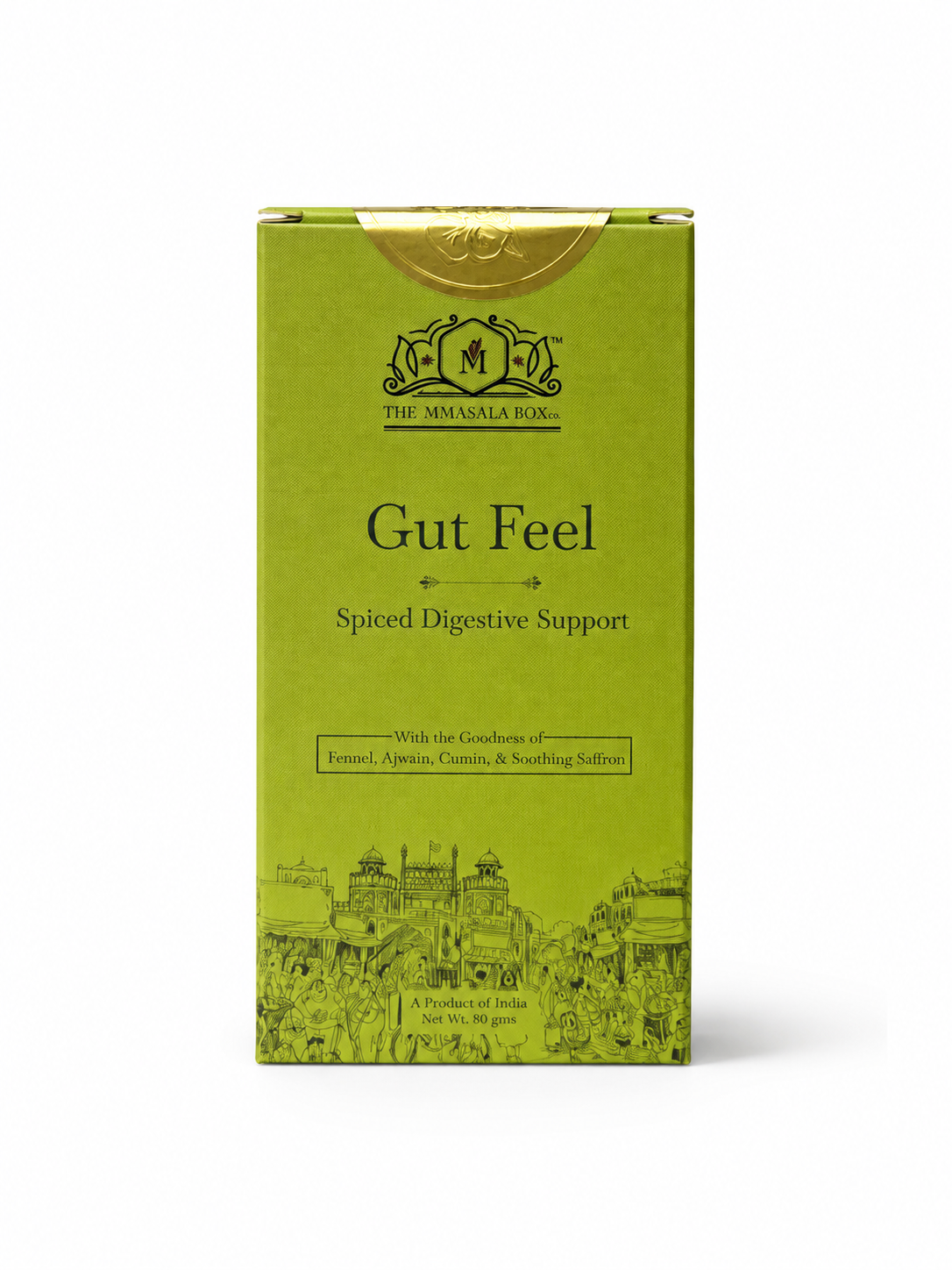 Woman holding Gut Feel Spiced Digestive Support wellness drink box with herbal tea, digestive spices, and wellness-focused product information by The Mmasala Box Co.